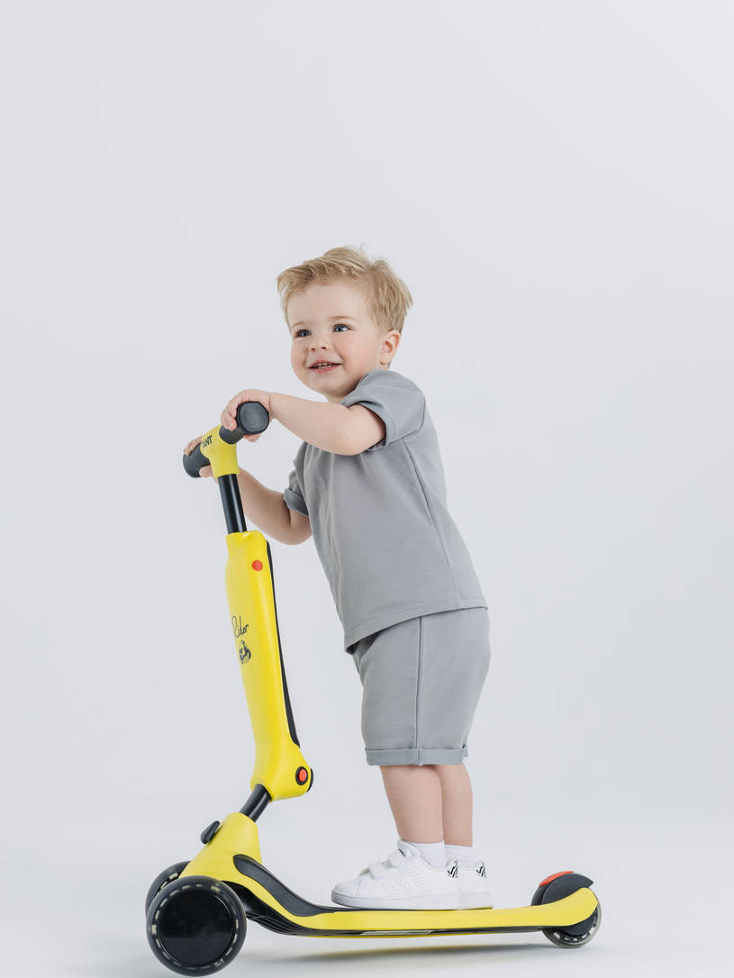 Беговел-самокат Rant Rider Plus со светящимися колесами желтый